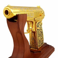 Золотой пистолет
