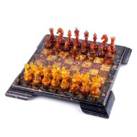 Подарочная шахматная доска из янтаря «Крепость» с фигурами