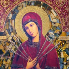 Подарочная икона «Семистрельная» из янтаря в багете