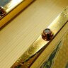 Священная книга «Коран» в золотом окладе в подарок мусульманину
