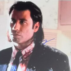 Фотография с личной подписью «Джон Траволта»