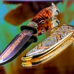 Коллекционный нож «Рысь» украшенный в стиле мастеров Златоуста с головой дикой кошки на рукоятке