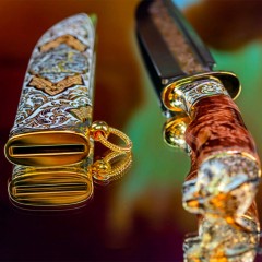 Коллекционный нож «Рысь» украшенный в стиле мастеров Златоуста с головой дикой кошки на рукоятке