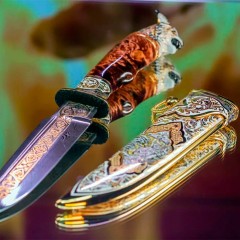 Коллекционный нож «Рысь» украшенный в стиле мастеров Златоуста с головой дикой кошки на рукоятке